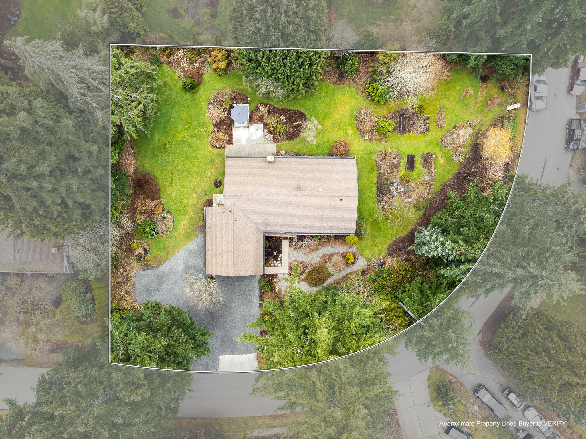 Drone view of this rare corner lot rambler home property in Woodinville!
