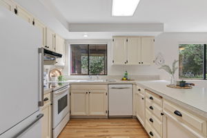 Kitchen has lots of counter, cabinet and pantry space for all your cooking needs!