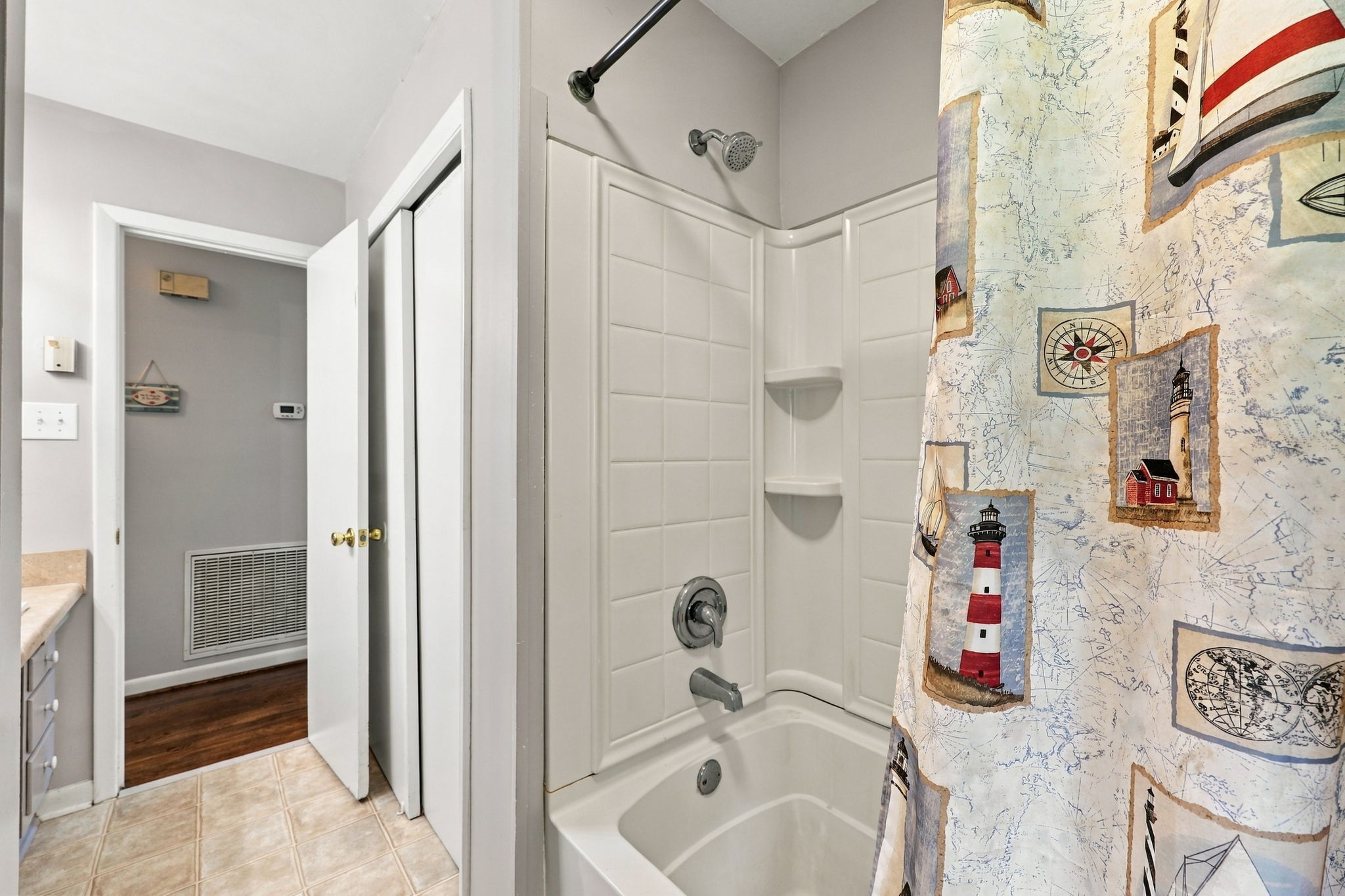 Bathroom Shower/Tub and Linen Closet
