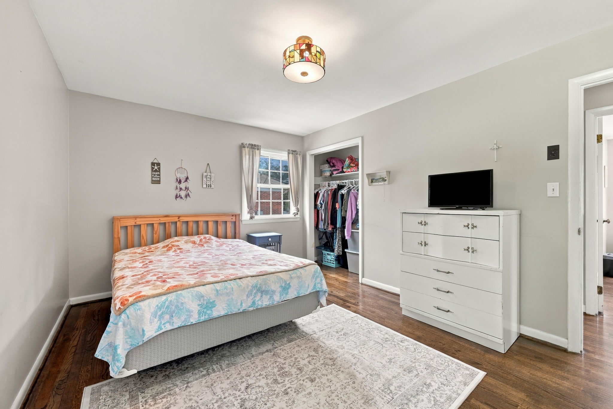 Primary Bedroom w/ Hardwood Floors