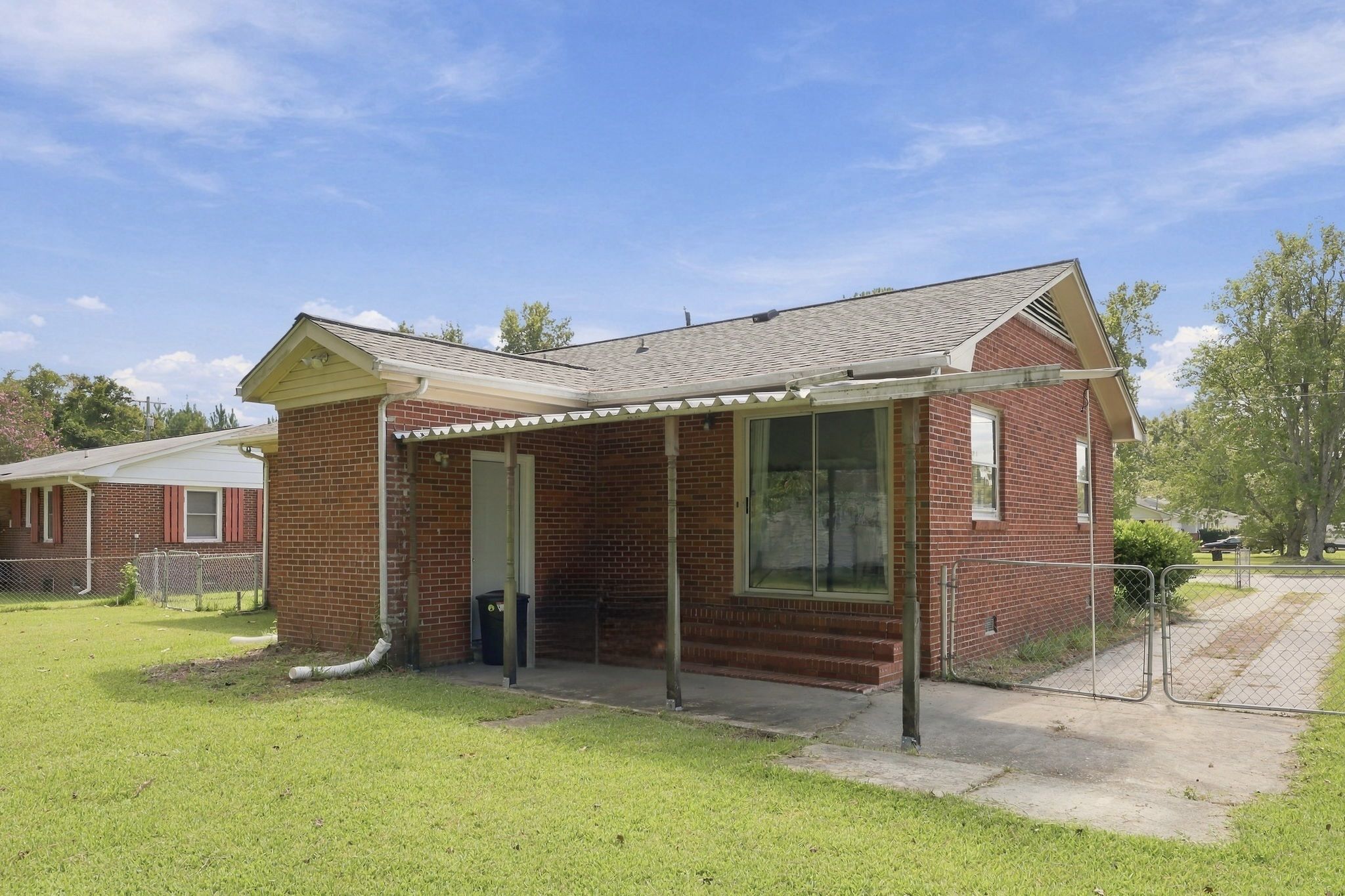 Covered Patio w/ Access to Laundry/Utility Room