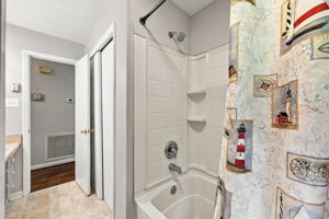 Bathroom Shower/Tub and Linen Closet