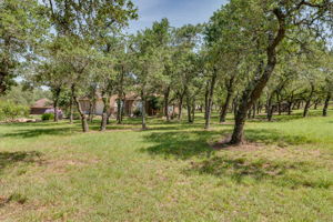 Home Sits Back from the Street amid Trees