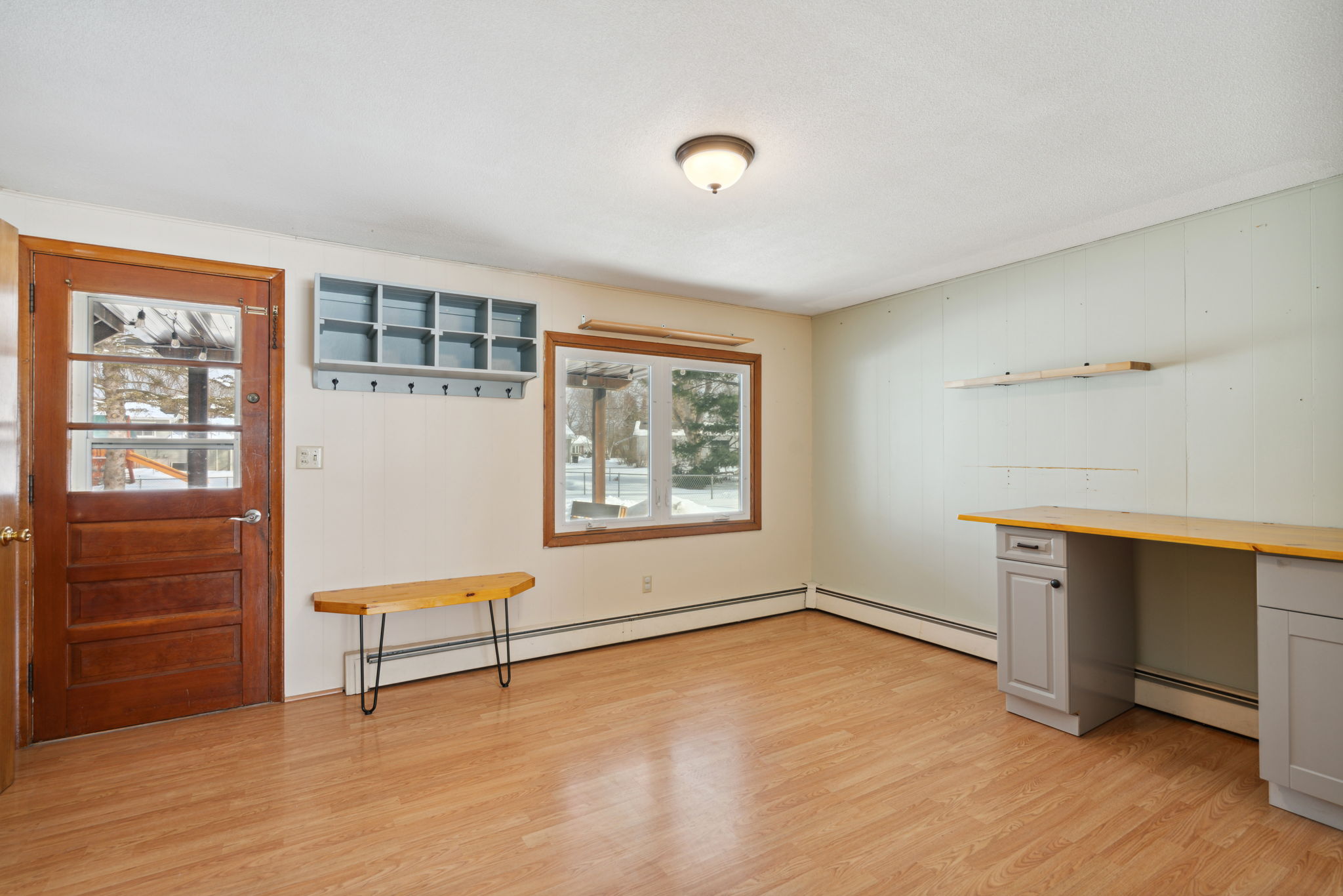Bonus Room in the lower level walks out to a patio