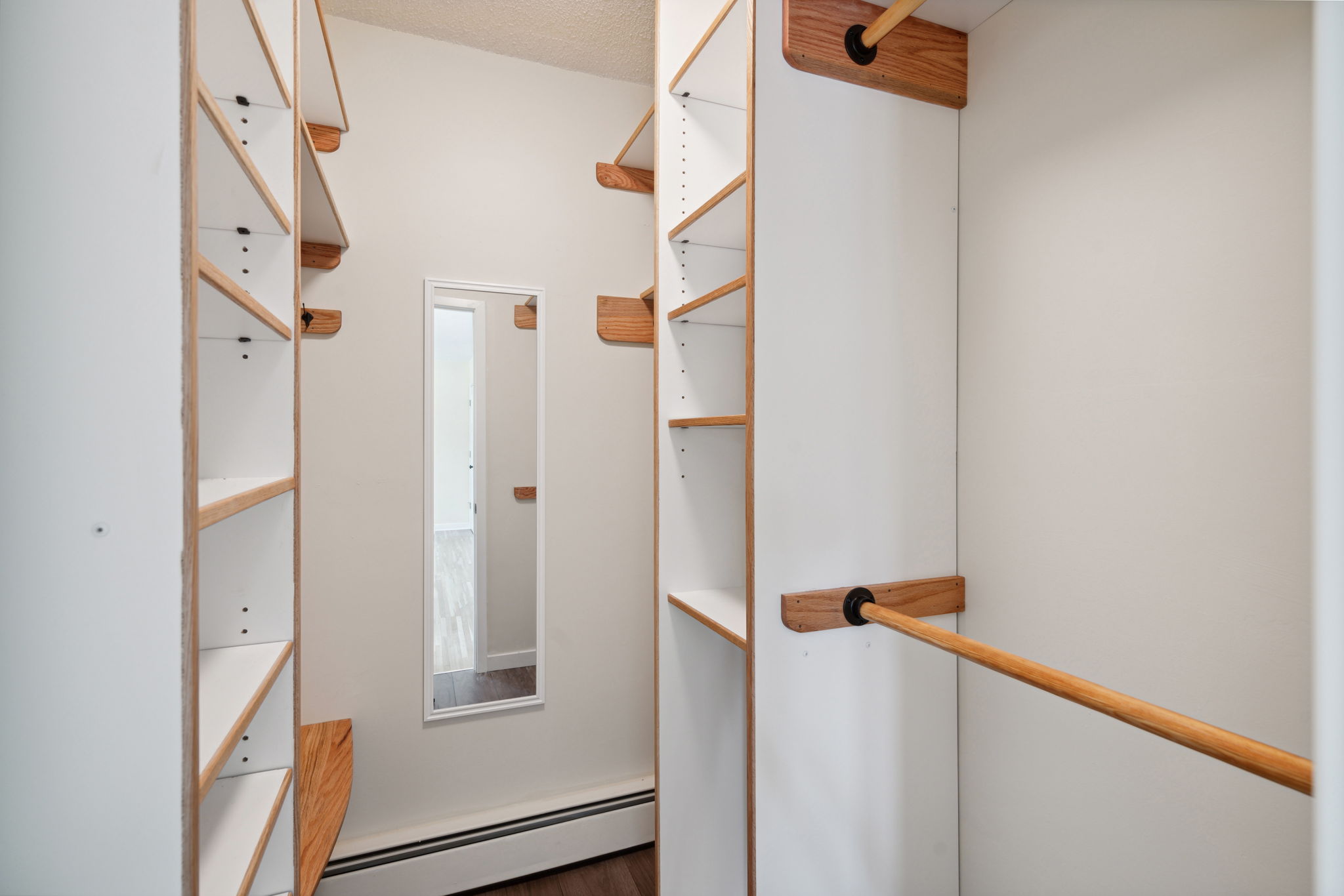walk-in closet in owners' bedroom