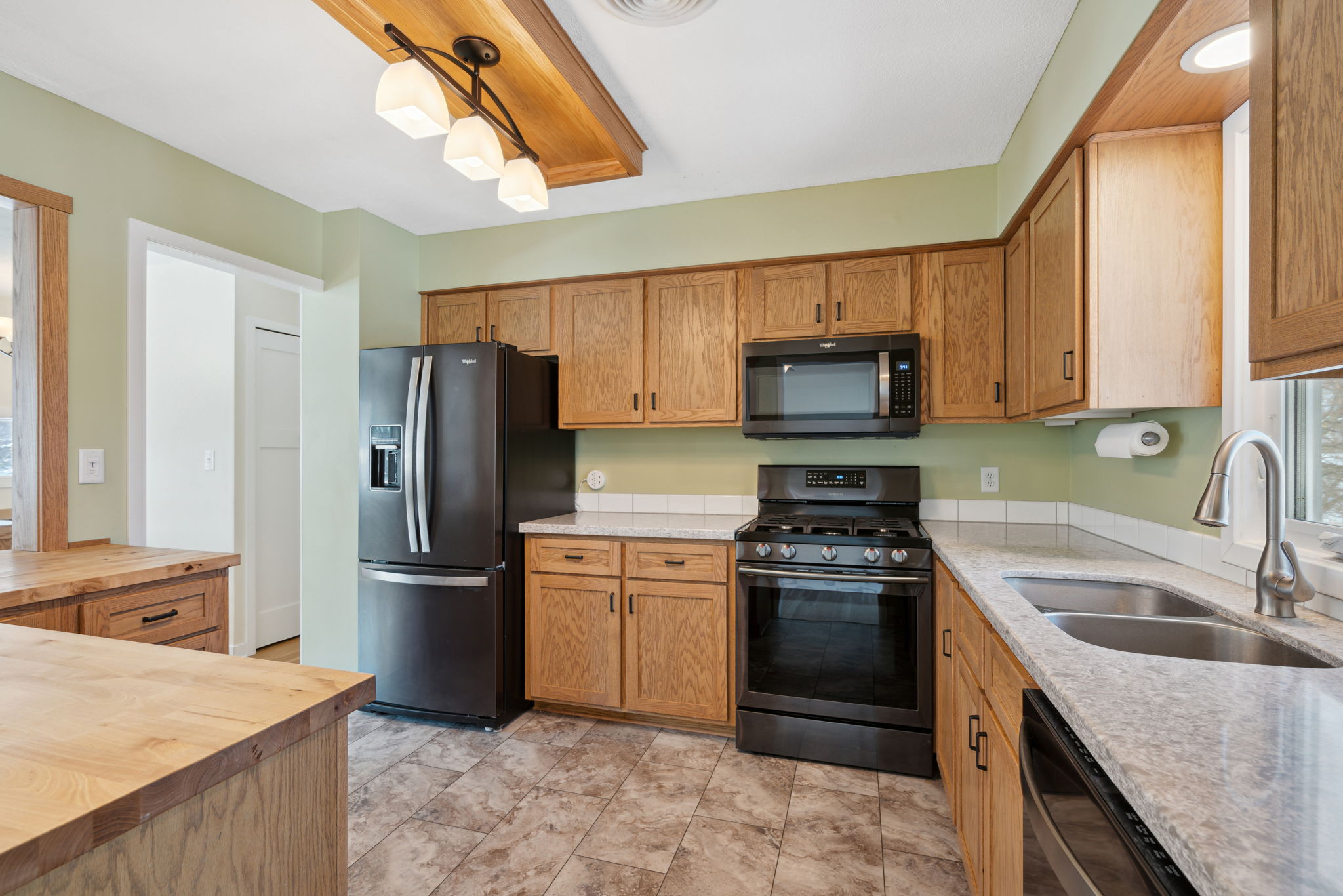 Updated kitchen with openings to the dining and living room