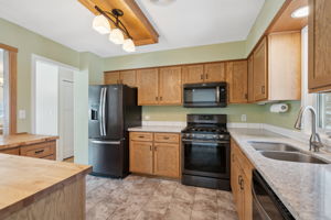 Updated kitchen with openings to the dining and living room
