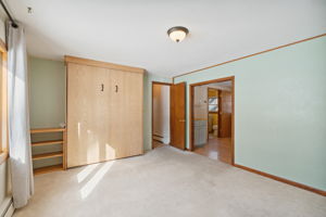 built-in murphy bed in lower level family room