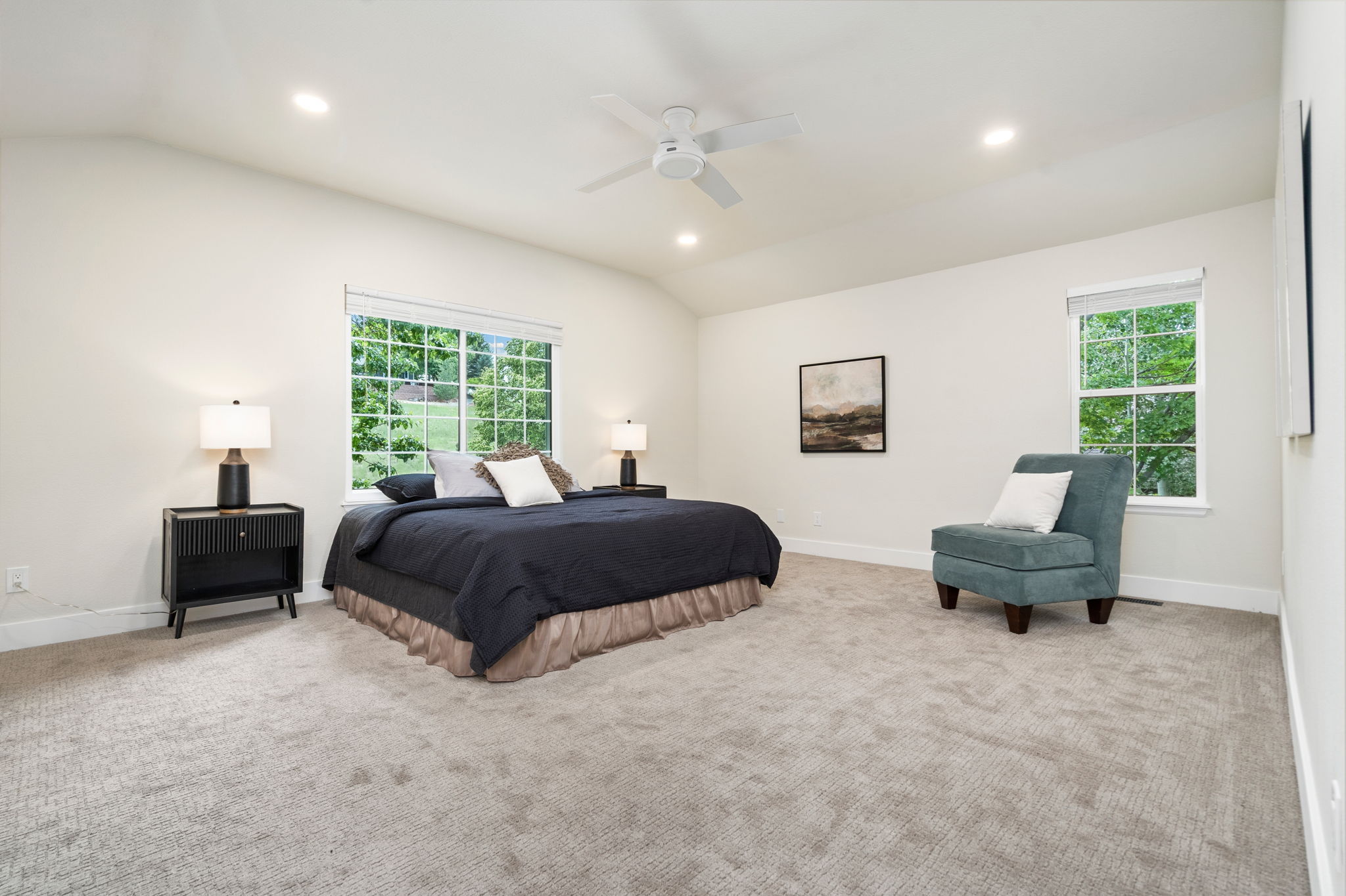 The primary bedroom overlooks the backyard, is complete with an ensuite bathroom and some separation from the other bedrooms for added privacy.