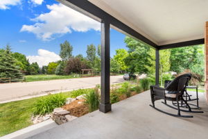 Enjoy mornings, evenings, and afternoons on this spacious front porch