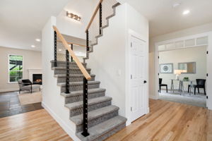 Even the staircase is updated and elegant. New carpet, paint, fixtures, and lighting throughout.