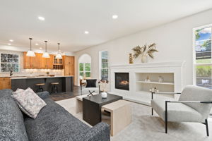 An open concept kitchen, family room, and all-season sunroom lends itself to being a fantastic place to gather.