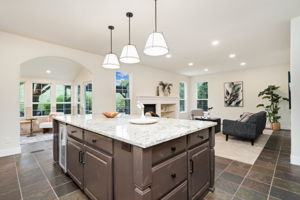 This kitchen offers prime real estate within the home-its smart location and layout are sure to make it a favorite gathering spot.