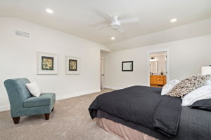 Large primary bedroom located on the second floor with room for a seating area and adjoined private ensuite. Check out the walk-in closet organization system!