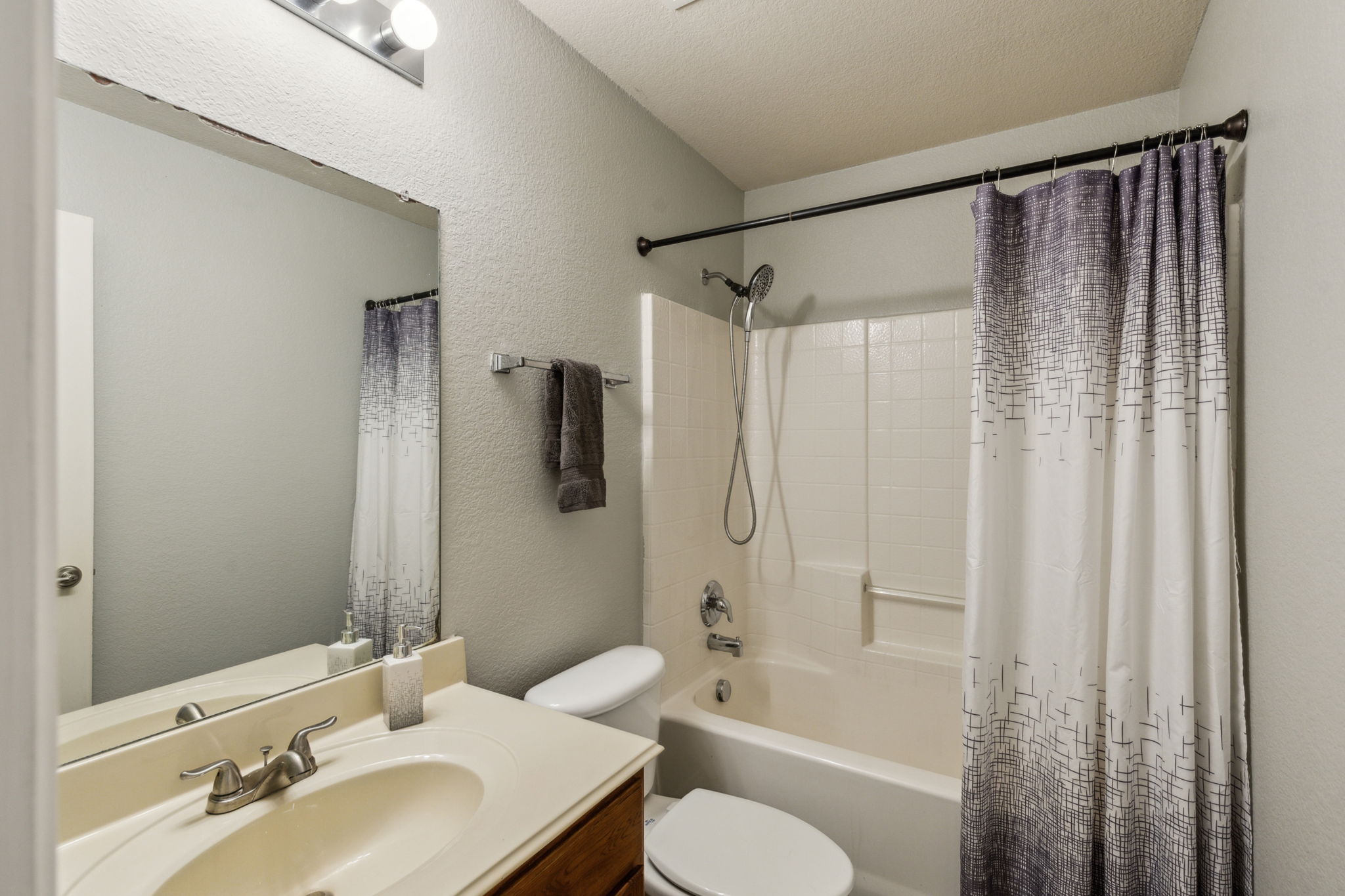 This full bath is great for guests and for the bedroom two and three to share!