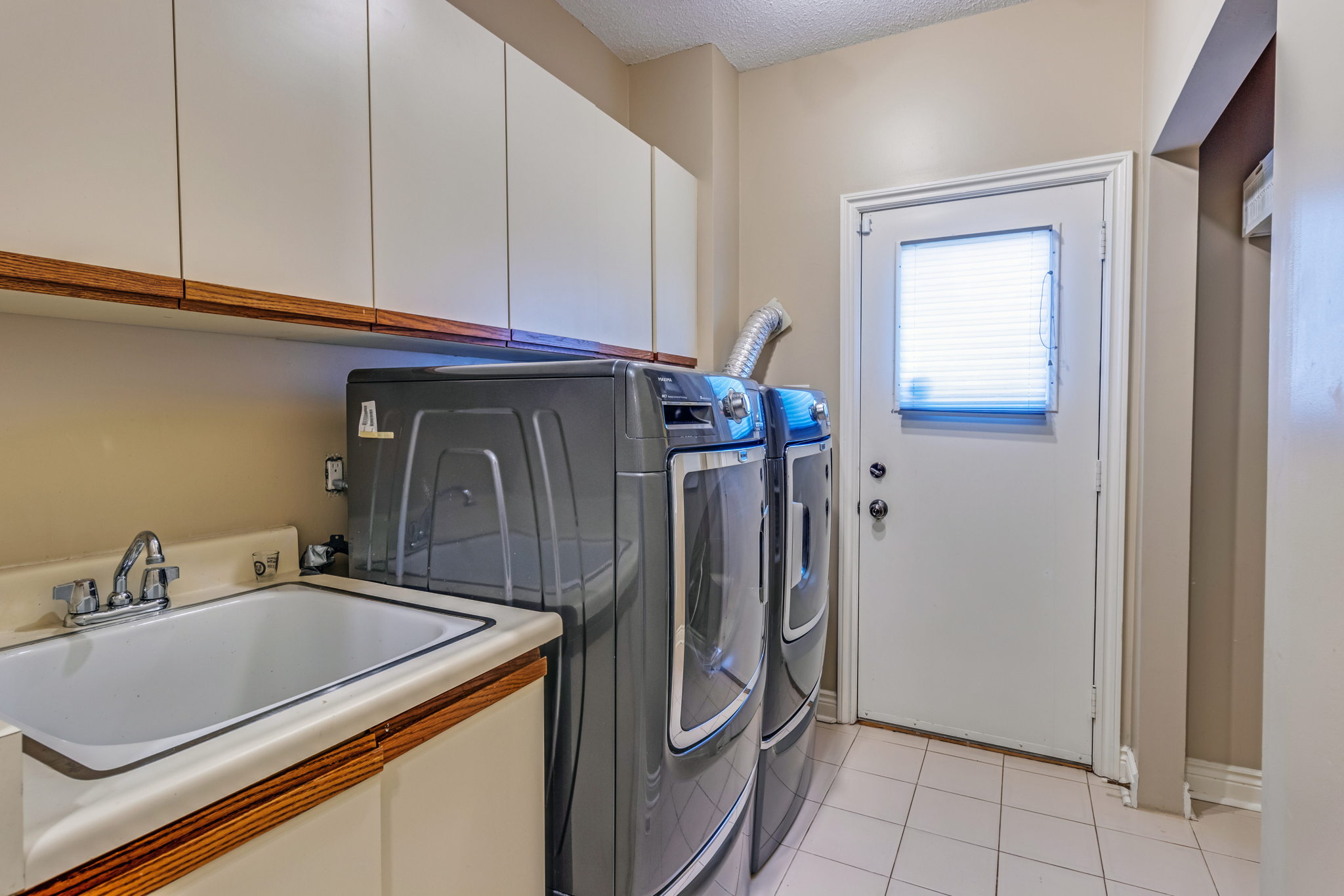 Laundry Room with Side Entrance