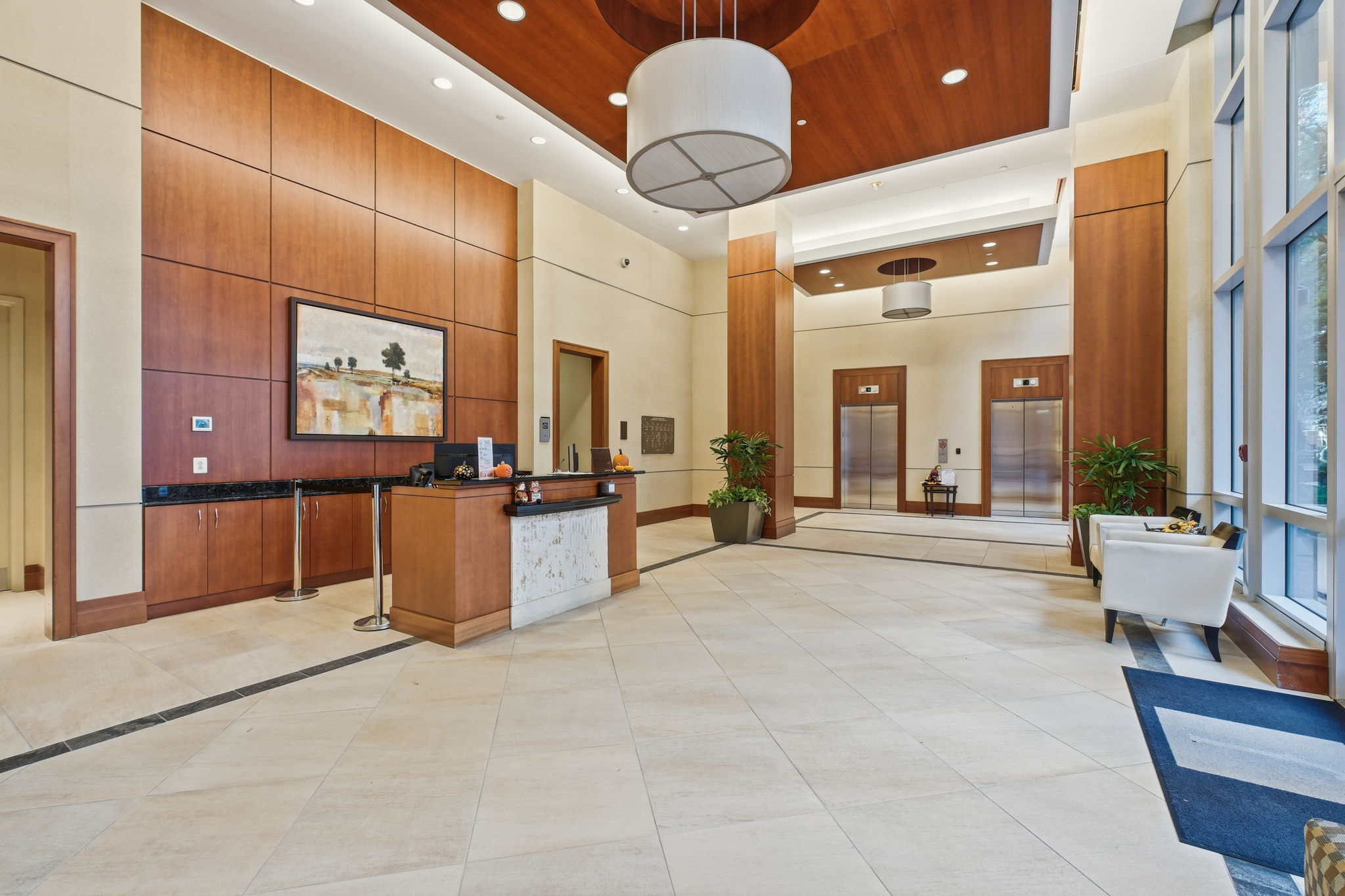 Enter a beautiful lobby, greeted by concierge, and