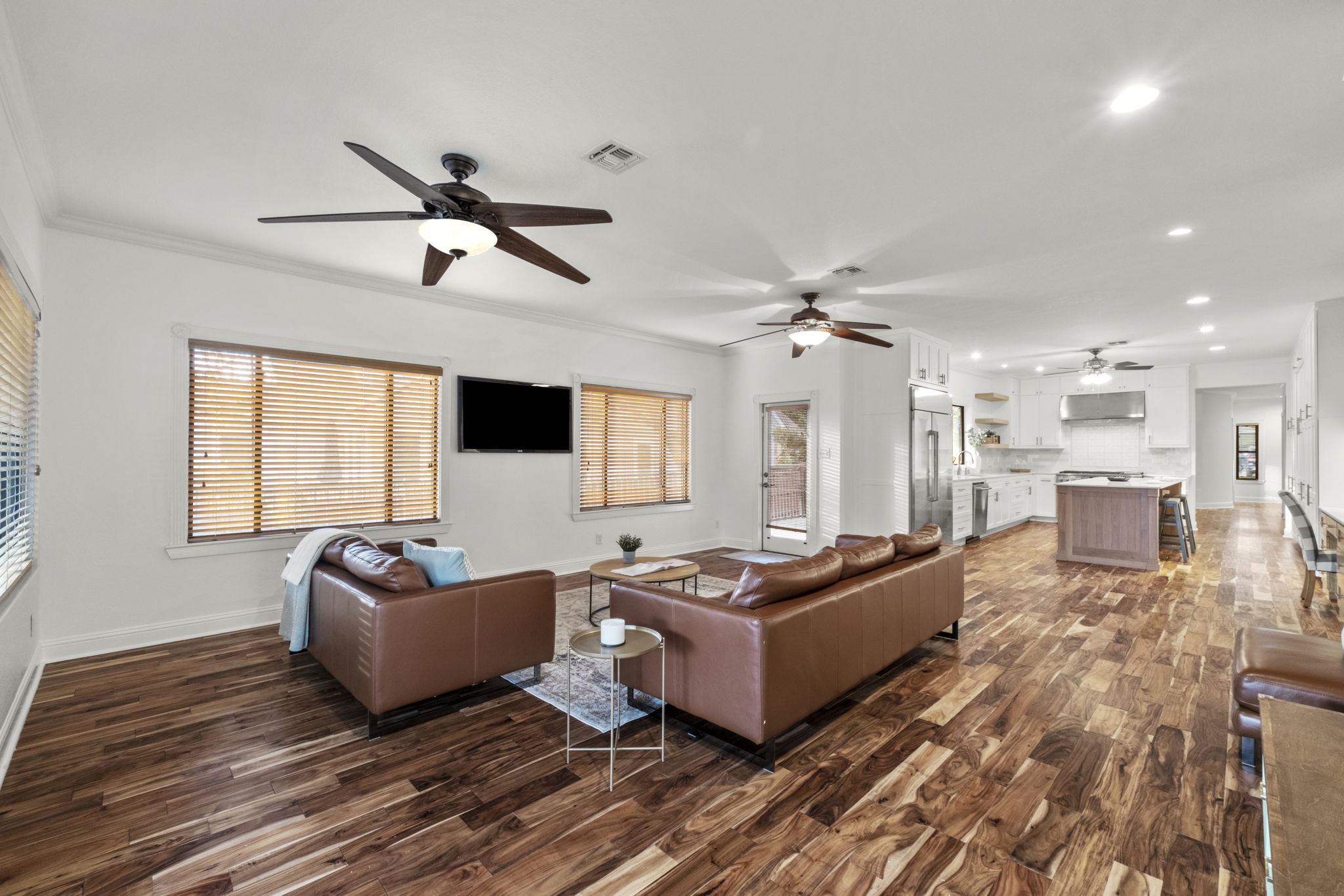 Consistent wood flooring throughout first floor