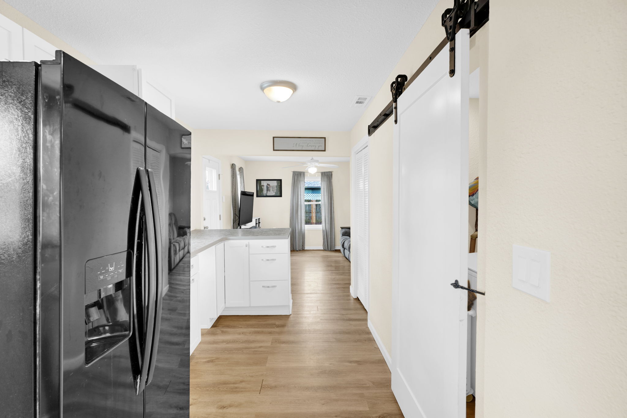 Sliding “Barn Door” Hides Laundry