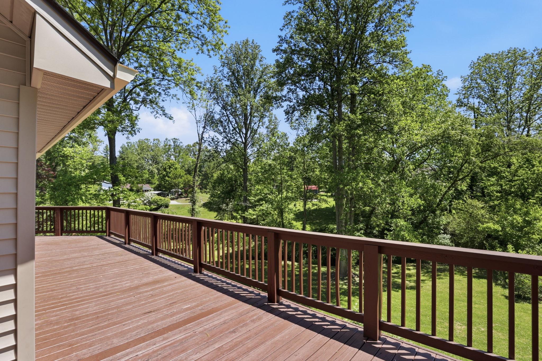Large wraparound deck with fresh paint