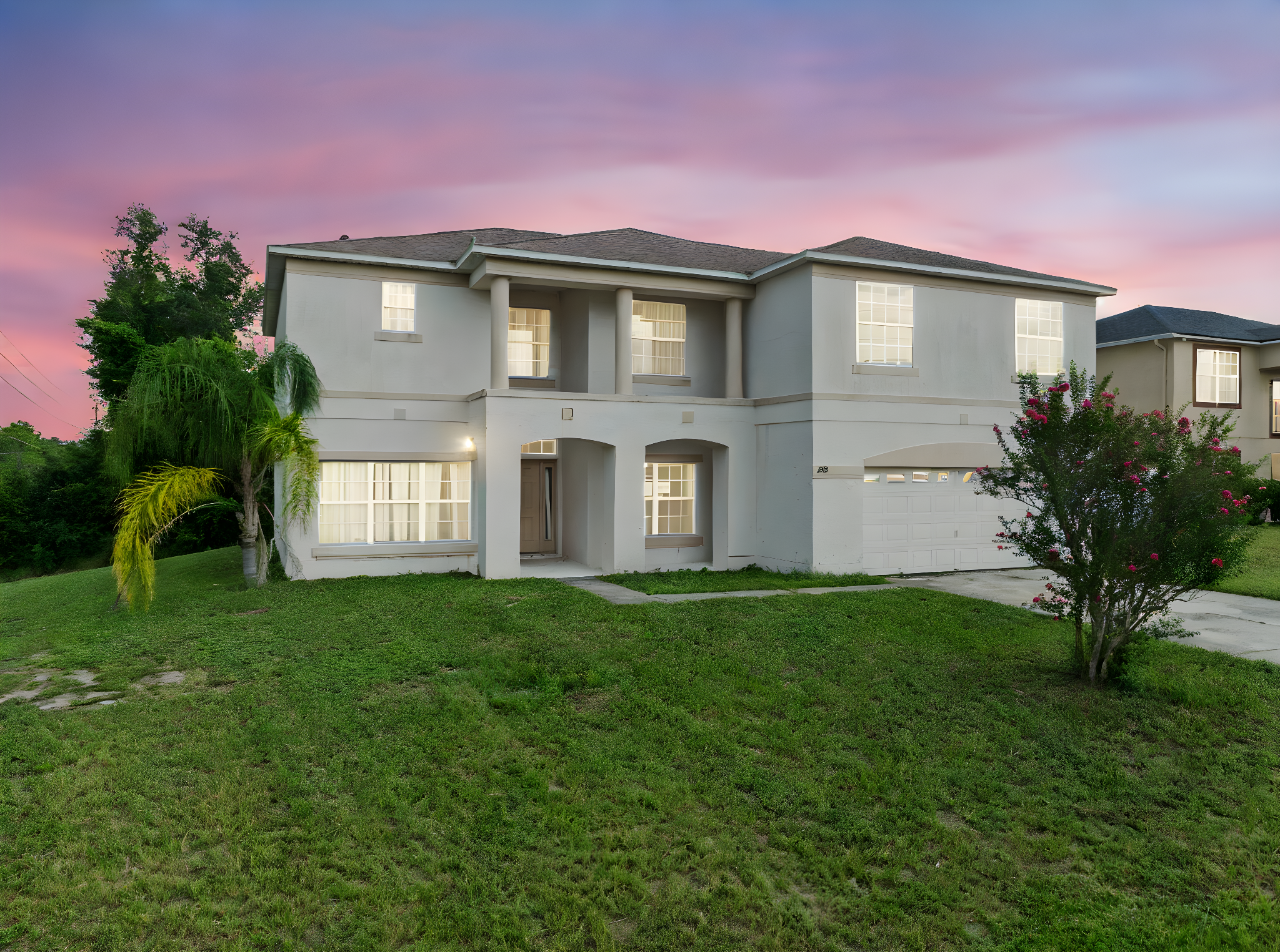 208 Athabasca Dr, Kissimmee, 347596 day to dusk.jpeg