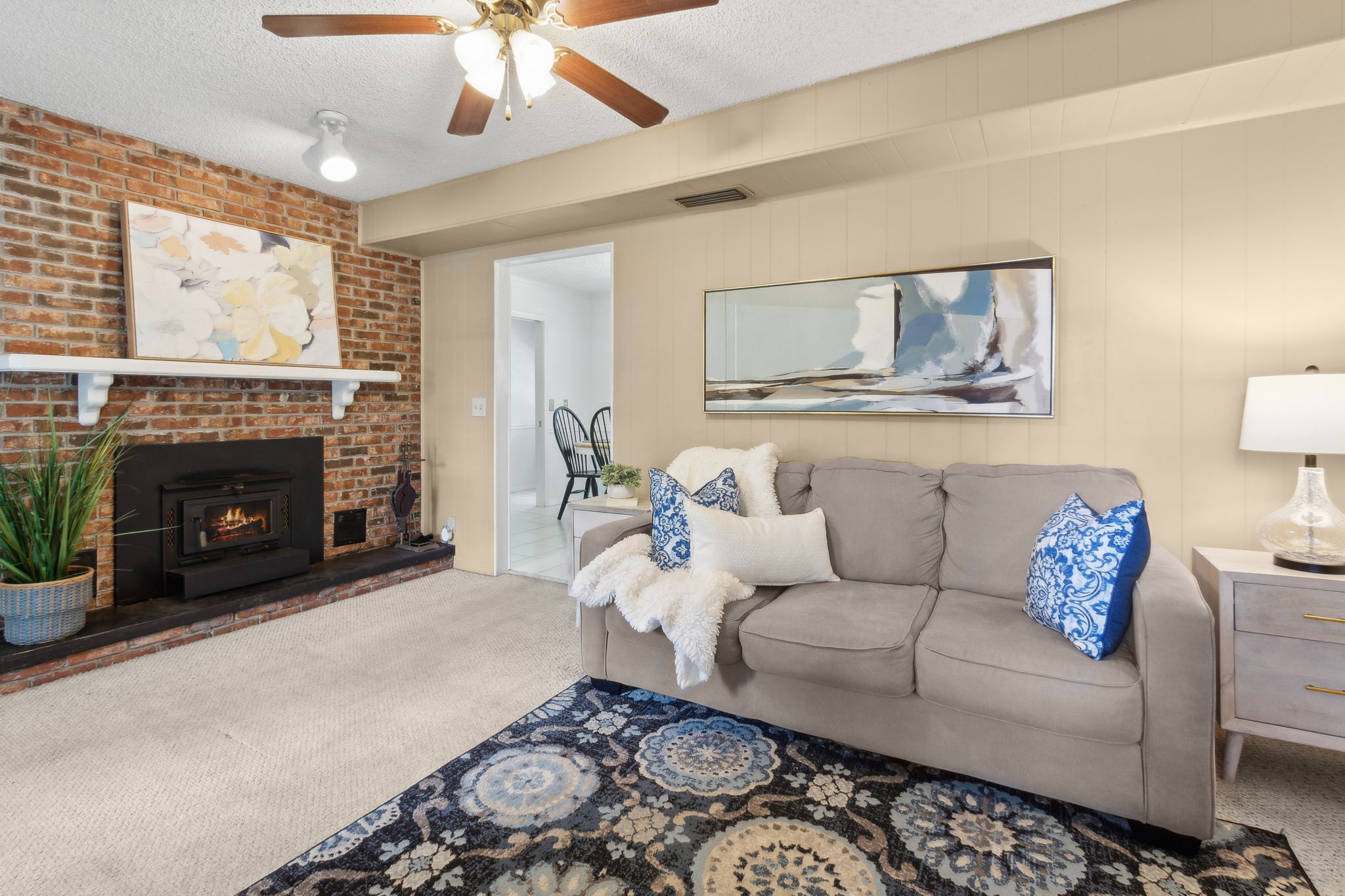 ... with floor-to-ceiling brick surround.
