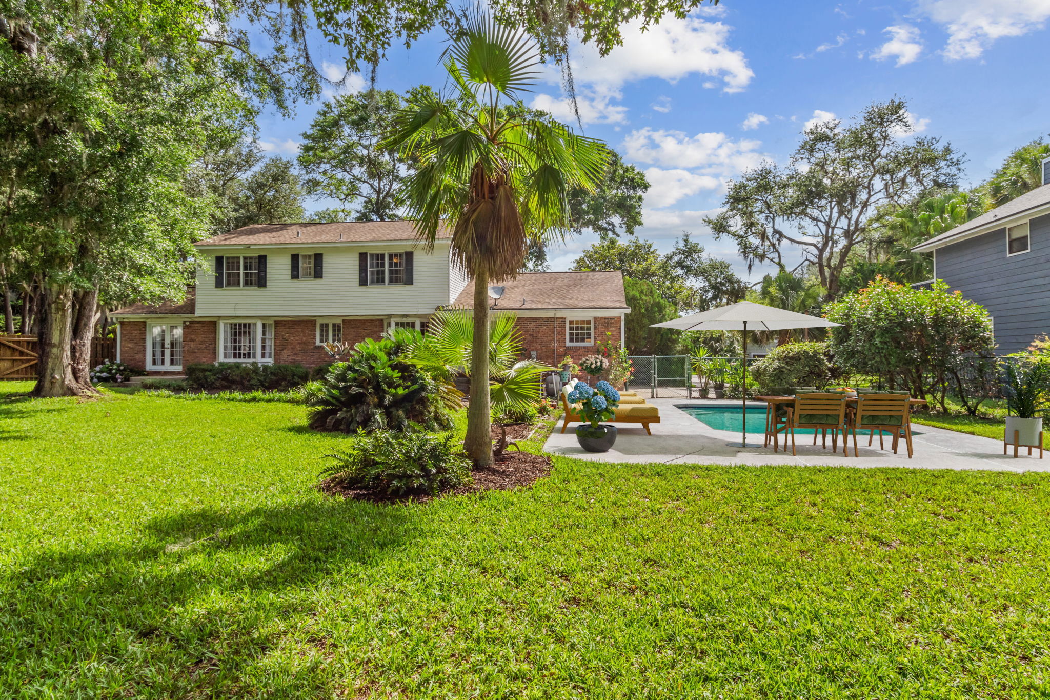 ... and an expansive paved surround for outdoor dining and sunning.