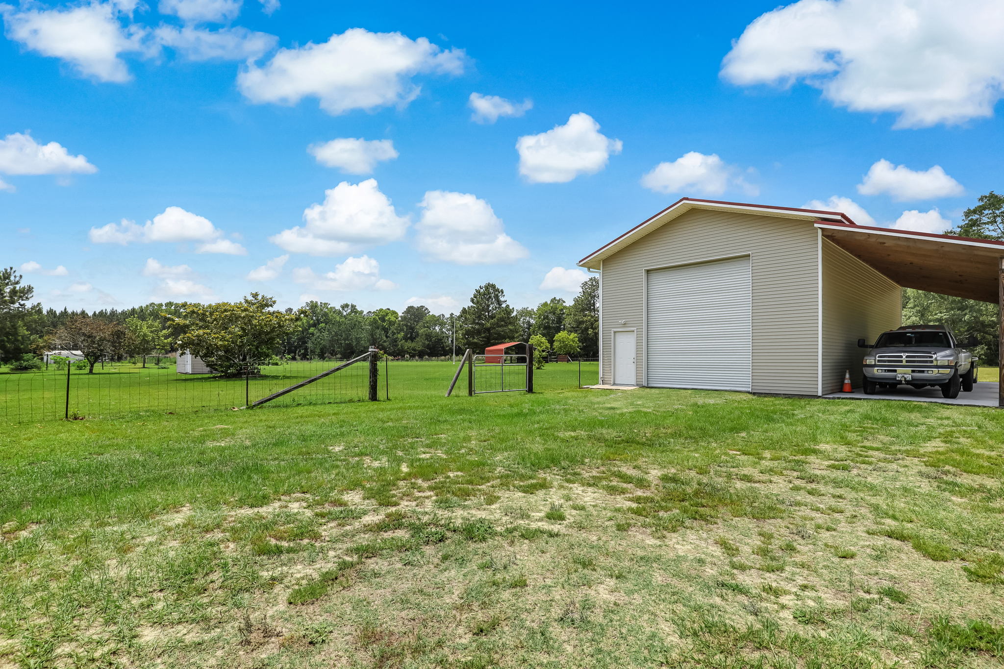 Workshop with side carport