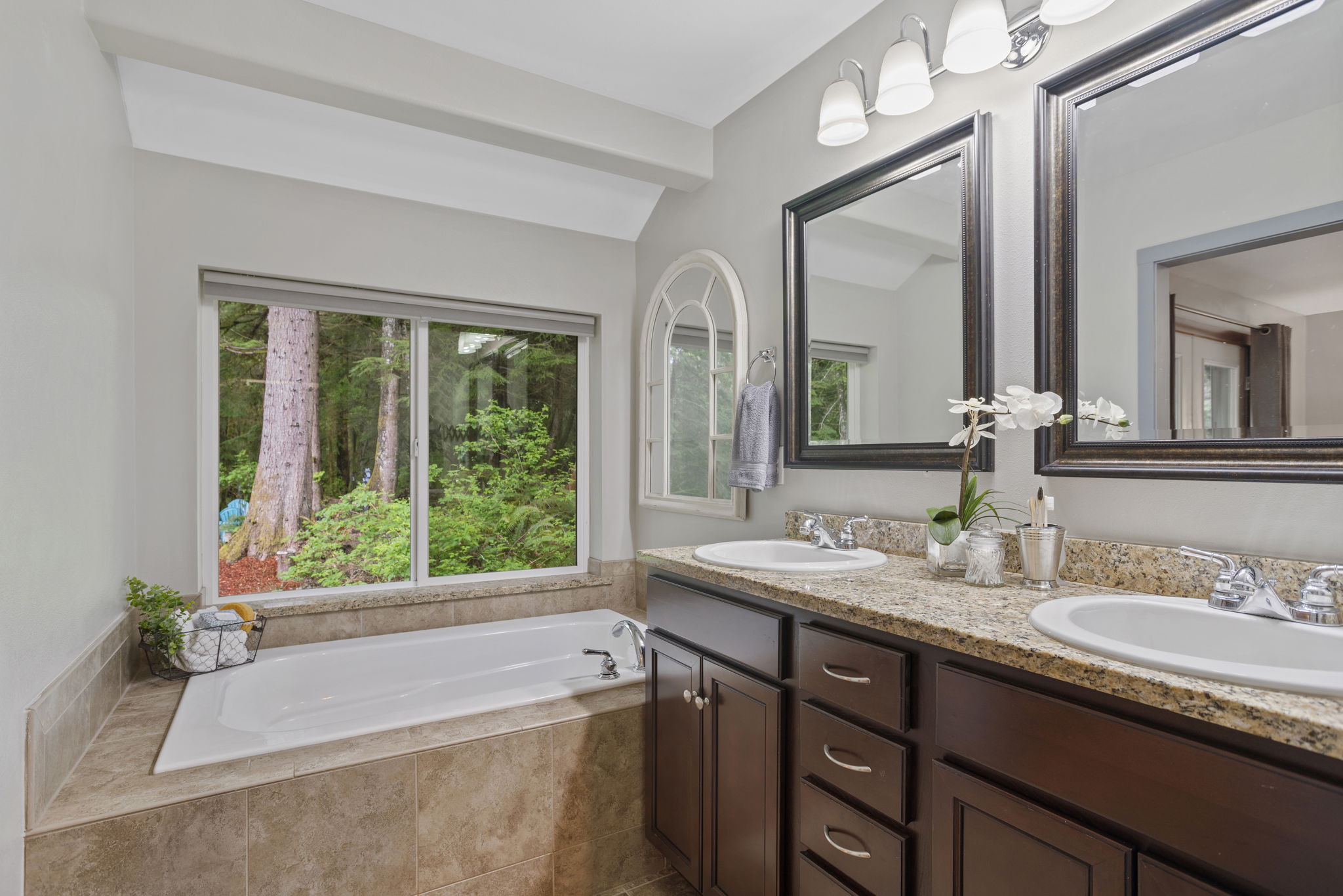 Primary ensuite boasts, large soaking tub and double sinks ......with a view!