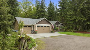 Large 3 car garage and RV parking on property