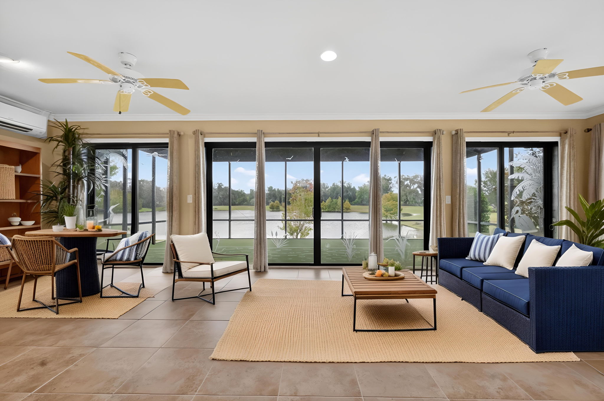 Virtually Staged - Expansive Enclosed Climate-Controlled Lanai with Water Views!