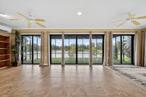 Expansive Enclosed Climate-Controlled Lanai with Water Views!