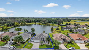 Aerial Front Elevation with Property Lines and Water Views