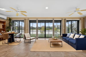 Virtually Staged - Expansive Enclosed Climate-Controlled Lanai with Water Views!