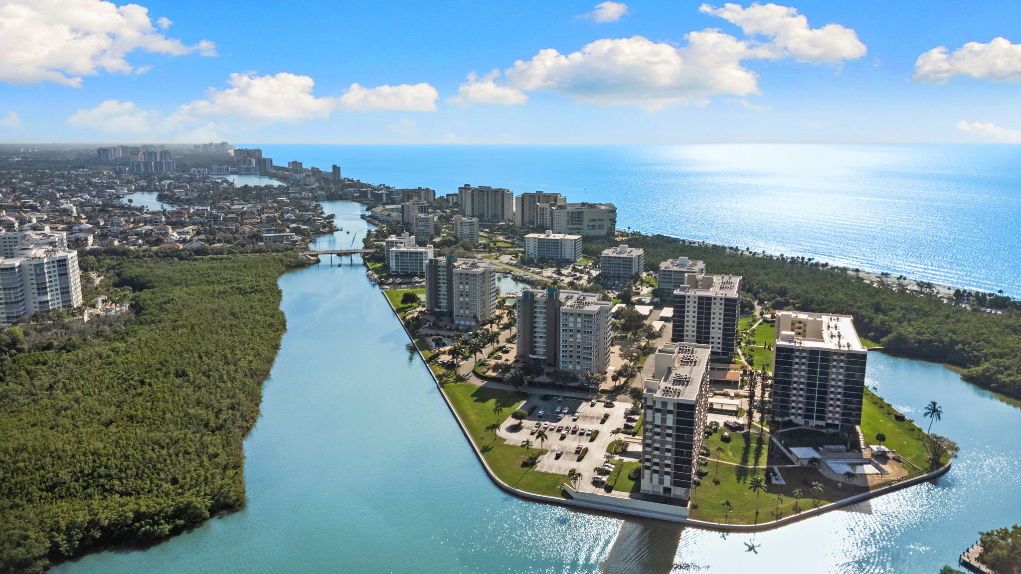 A rare coastal setting with the Gulf of Mexico on one side and tranquil bay waters on the other