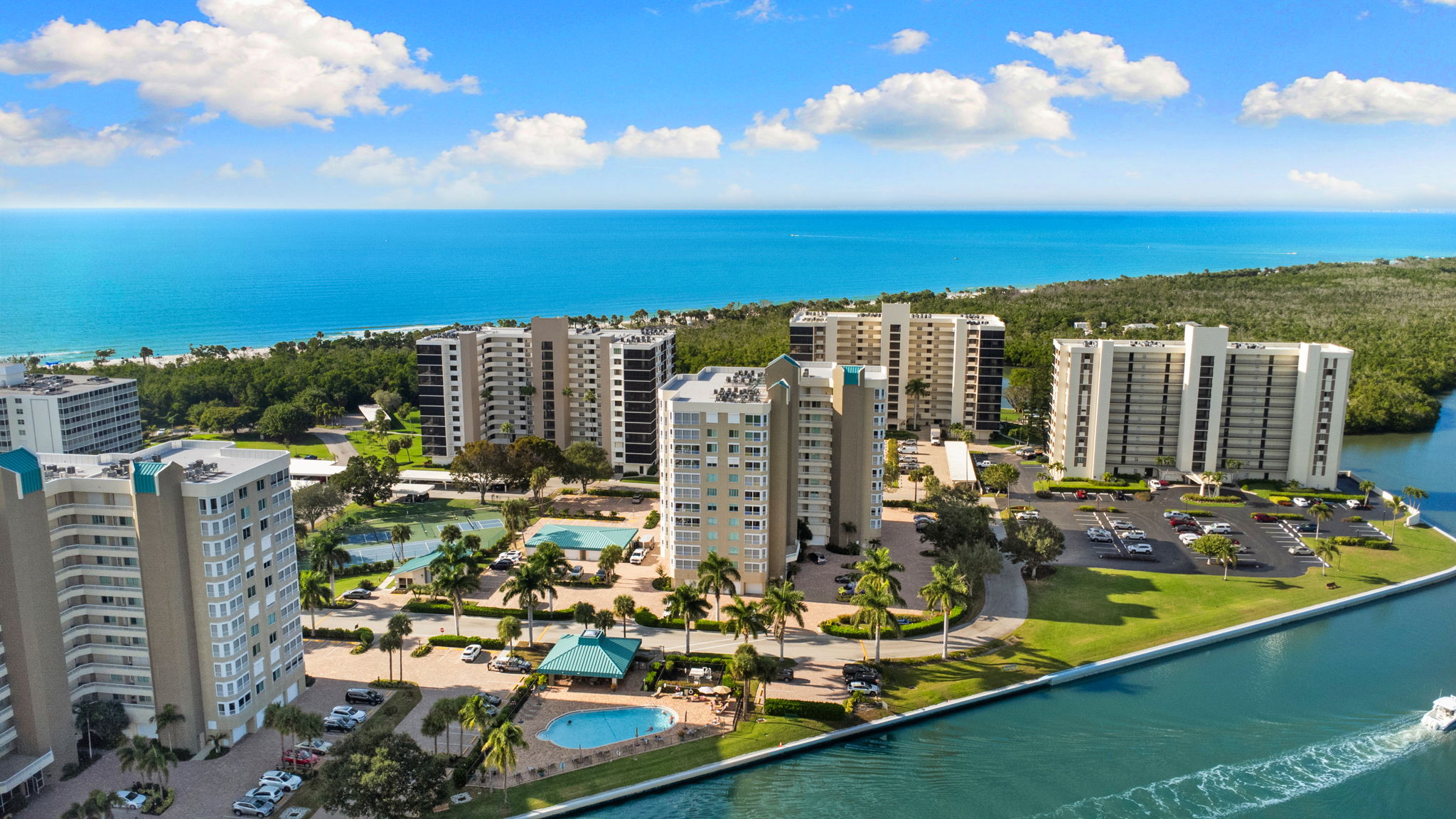 Aerial view highlighting Gulf-front living with direct boating access.