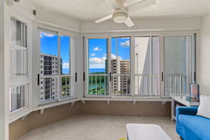 Bright, glass-enclosed lanai offering flexible bonus space with views and natural light