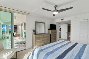 Primary suite with private lanai access, perfect for morning light and coastal breezes