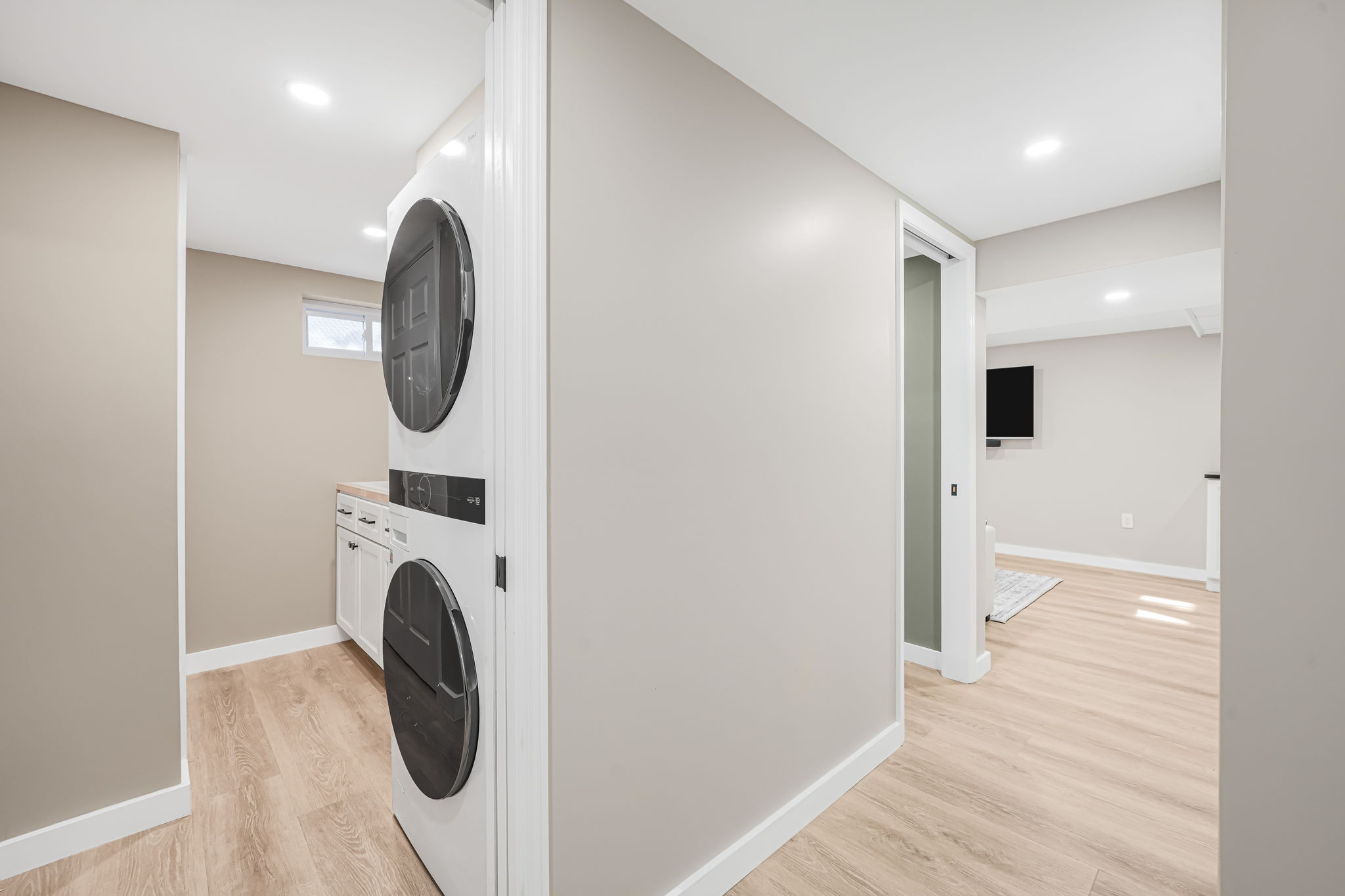 Laundry Room with counter and storage
