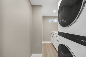 Laundry Room with counter and storage