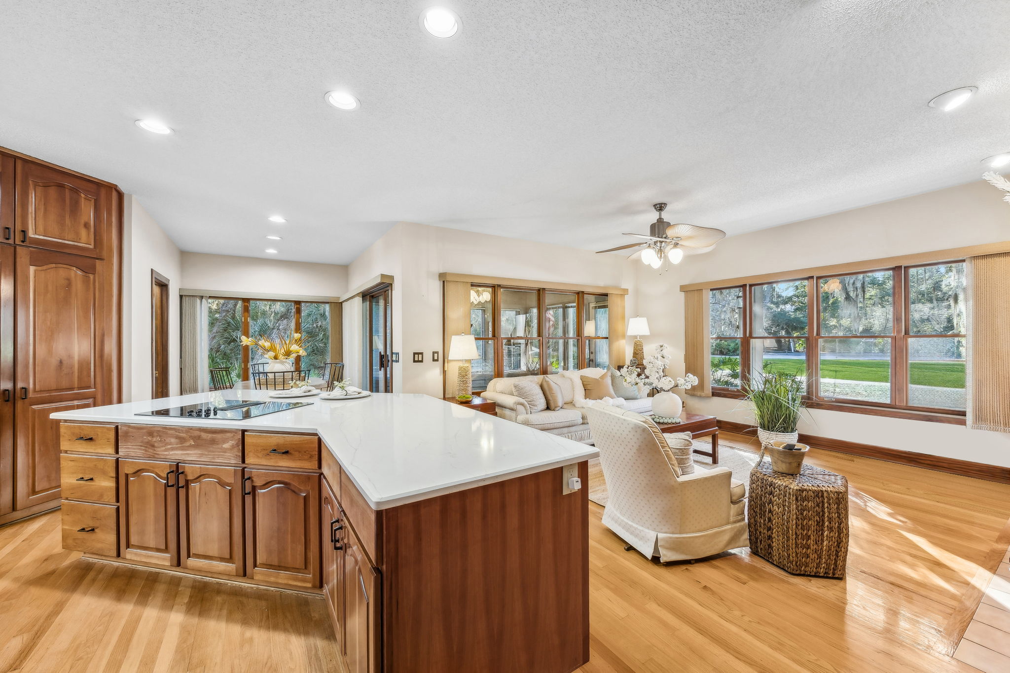 Open to the kitchen, the family room continues the home’s thoughtful design ...