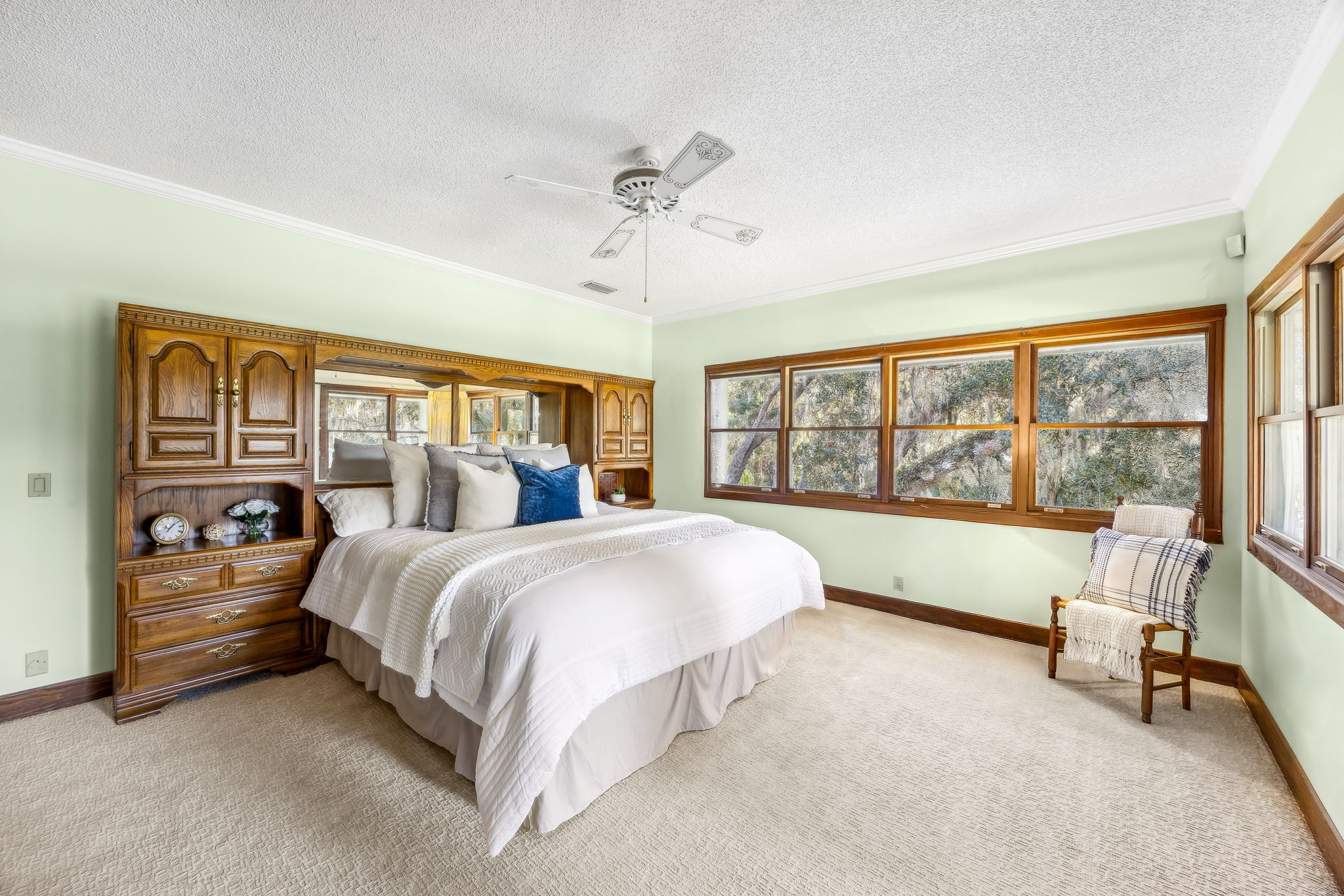 ... the primary suite offers a spacious bedroom