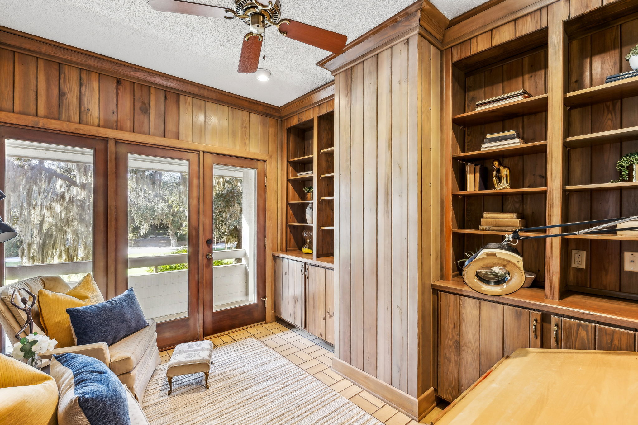 A private, light-filled office within the primary suite captures scenic views.