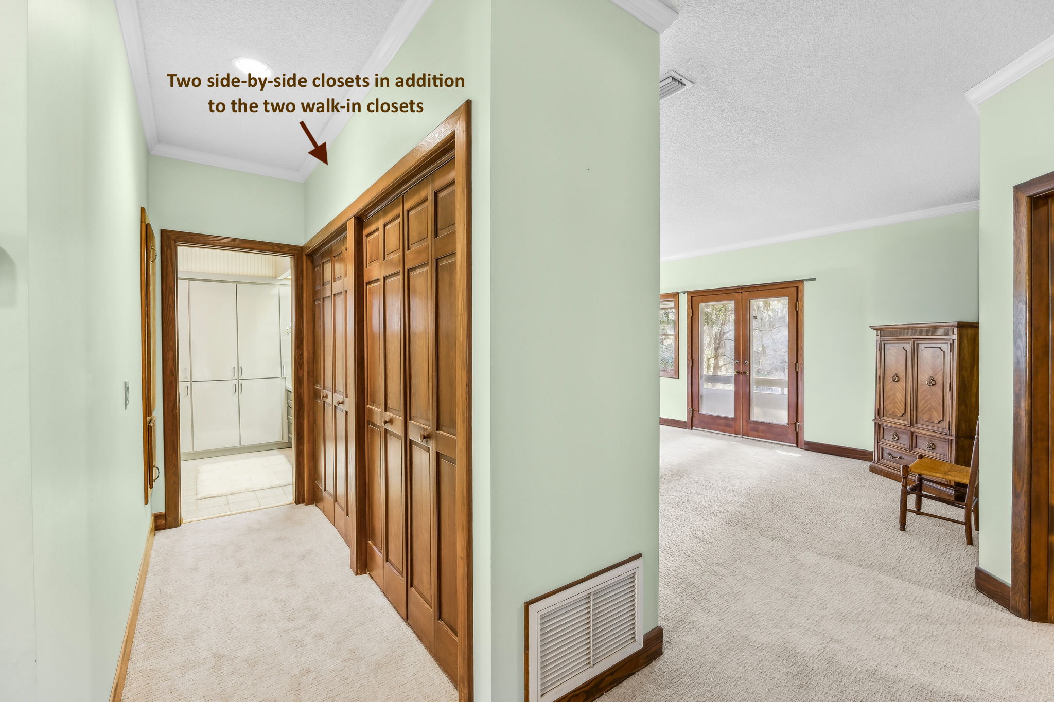 Three additional closets complete this private corner of the primary wing.