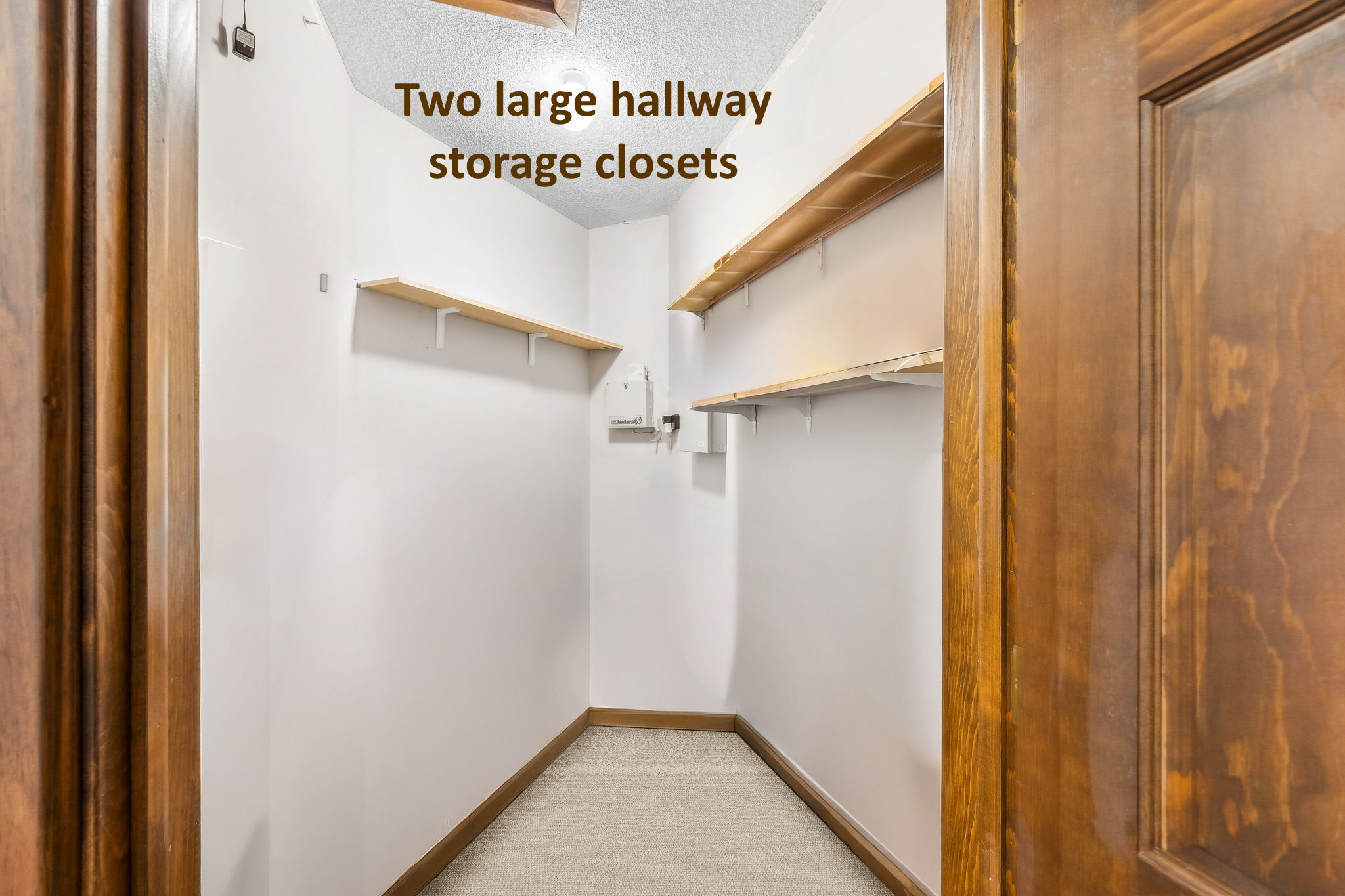 Two large storage closets along the hallway reflect the home’s intentional approach to organization.