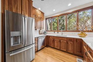 Expansive windows wrap the space ...