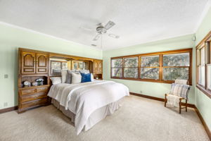 ... the primary suite offers a spacious bedroom