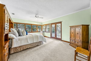 ... and opening to a balcony with golf course views.