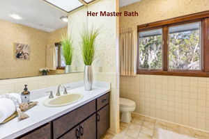 Her bath: featuring a generous vanity ...