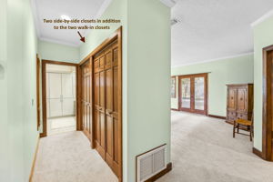 Three additional closets complete this private corner of the primary wing.